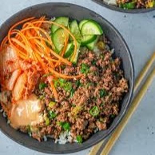Korean Rice Bowl - BBQ Ground Beef, Fried egg, Cucumber, Carrots.