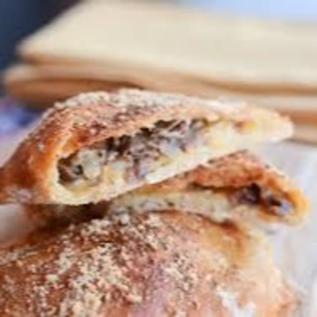 Steak n Cheese Calzone.